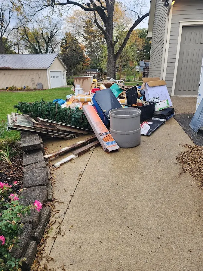 Dumpster being loaded with debris for Residential Dumpster Rental in Medina